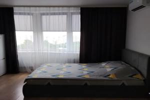 Uyutnaya studiya v novom dome v tsentre Apartments, Tomilino