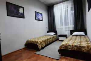 Dvuhmestnyy nomer s 2 otdelnymi krovatyami ekonom Apartments, Nizhniy Tagil