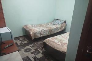 Dvuhmestnyy nomer s 2 otdelnymi krovatyami ekonom Apartments, Cholpon-Ata