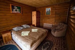 Tryohmestnyy nomer v derevyannom dome Apartments, Vyaznika