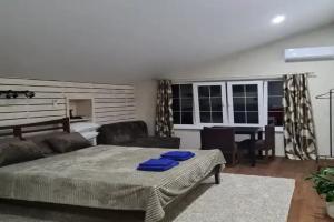 Uyutnaya komnata dlya otdyha Apartments, Ashe