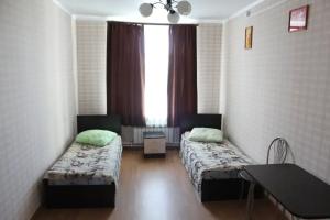 Dvuhmestnyy nomer s 2 otdelnymi krovatyami standart Apartments, Torzhok
