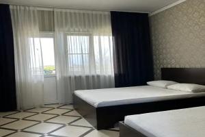 Tryohmestnyy nomer standart Apartments, Alakhadzi