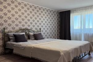 Otlichnaya ryadom s ZhD-vokzalom Apartments