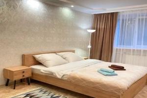 Uyutnaya 2 komnatnaya ryadom s aeroportom Tolmachyovo i Ekspotsentrom Apartments, Ob'