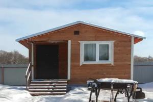 Domik na beregu pruda Cottage, Tula