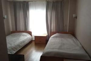 Dvuhmestnyy nomer s 2 otdelnymi krovatyami standart Apartments, Kondopoga