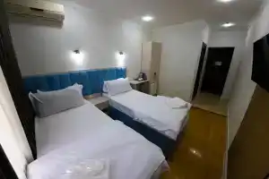 Dvuhmestnyy nomer s 2 otdelnymi krovatyami De Lux Twin Apartments, Tashkent