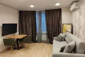 Dizaynerskaya teplaya i uyutnaya studiya- v ZhK Novotomilino Apartments, Tomilino