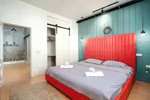 Dizaynerskaya v stile loft c panoramnym vidom Apartments, Almaty