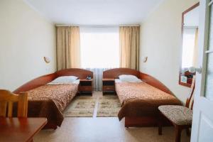 Dvuhmestnyy nomer s 2 otdelnymi krovatyami standart "byudzhet" s dopolnitelnym mestom Apartments, Vologda