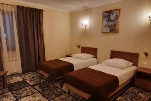 Dvuhmestnyy nomer s 2 otdelnymi krovatyami uluchshennyy Apartments, Sergiyev Posad
