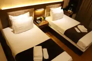 Dvuhmestnyy nomer s 2 otdelnymi krovatyami Standartnyy Apartments, Tashkent