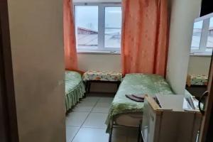 Dvuhmestnyy nomer s 2 otdelnymi krovatyami standart Apartments, Kirillov