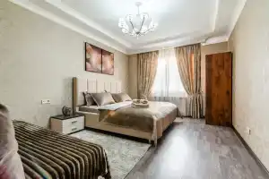 ZhK Mega tower vozle TRTs Mega Apartments, Almaty
