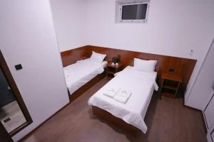 Dvuhmestnyy nomer s 2 otdelnymi krovatyami uluchshennyy Apartments