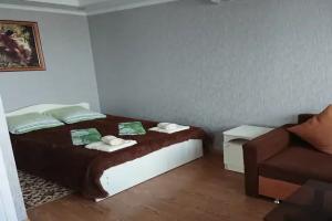 Chetyryohmestnyy nomer lyuks s vidom na more Apartments, Lazarevskoye