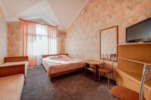 Chetyryohmestnyy nomer s balkonom Apartments, Lazarevskoye