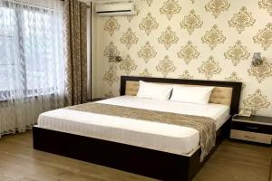 Semeynyy nomer uluchshennyy s vidom na gorod Apartments, Astrakhan