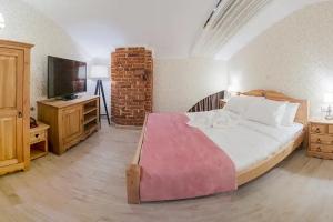 Dvuhmestnyy s 1 krovatyu rozovyy De luxe Apartments, Ryazan