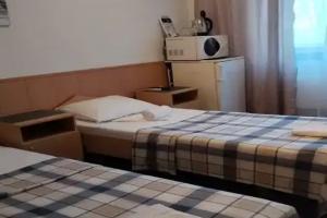 Dvuhmestnyy nomer s 2 otdelnymi krovatyami uluchshennyy s vidom na more Apartments, Lazarevskoye