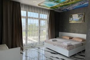 Tryohmestnyy nomer delyuks "Blue Wave" bez balkona Apartments, Alakhadzi