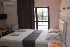 Standart dlya roditeley i rebyonka s vidom na more Apartments, Lazarevskoye