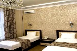 Dvuhmestnyy nomer s 2 otdelnymi krovatyami standart Apartments, Astrakhan