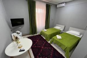 Dvuhmestnyy nomer s 2 otdelnymi krovatyami no1 Dvuhmestnyy standart Apartments, Derbent