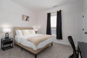 Spacious Living Area and Fully Equipped Kitchen - Charming Escape Apartments, Chicago