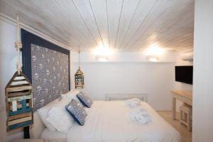 Blue, White and Grey Suites, Ornos