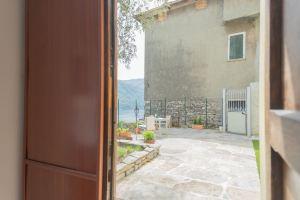 La Quiete with Private Garden by Rent All Como Hotel, Laglio