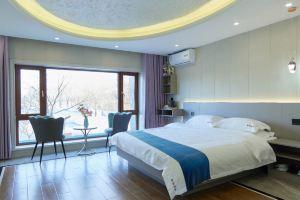 Zhuoguan Light Luxury Hotel (Wangsu Street Riverside Branch)