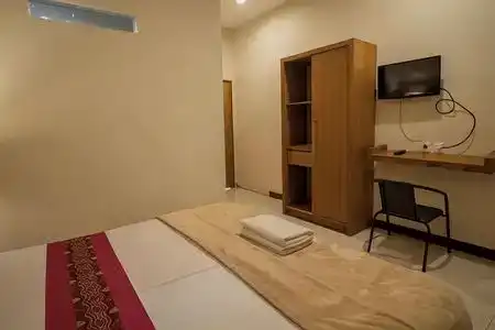Kuta Suci Guest House - 9