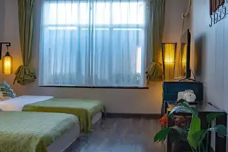 Menghuan Dali Topic Guest House - 105