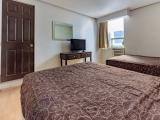 Standard Double Room With Two Beds And Air Conditioner