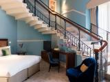 the Grand Staircase Suite, 1 Bedroom Bi-Level Suite, 1 King