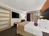 Suite-1 King Bed, Non-Smoking, Separate Living Area, Two Full Bathrooms, Sofabed, Microwave And Refrigerator