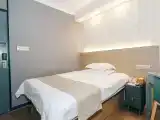 Hotel Room (Queen bed) (No window)