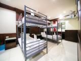 Single Bed In Dormitory Room