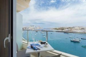 Strand Suites by Neu Collective, Gzira