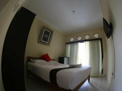 Sari Buana Bed & Breakfast - 9