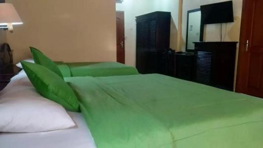 Pesona Beach Inn - 11